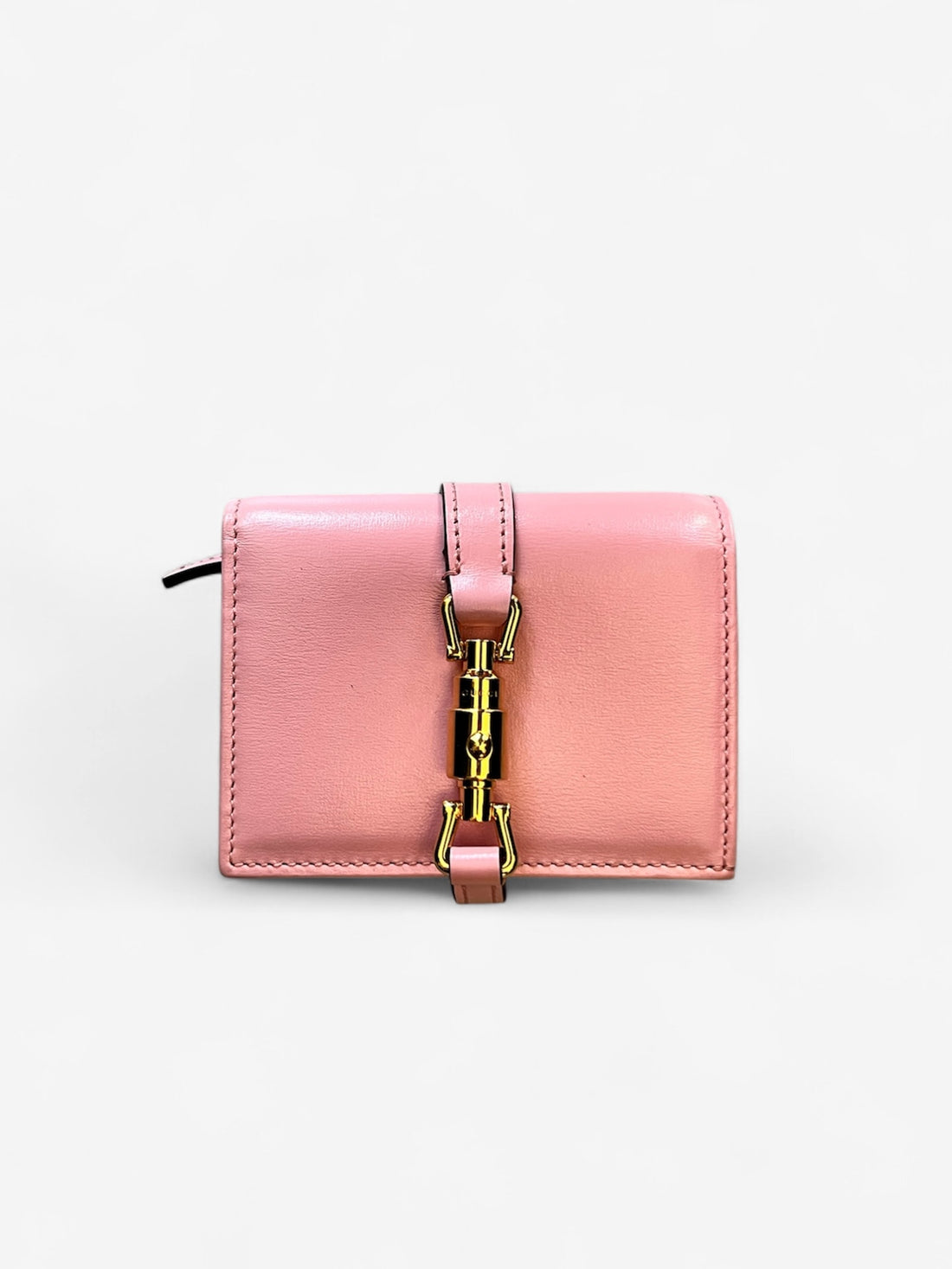 portefeuille Gucci Jackie 1961 de couleur rose.